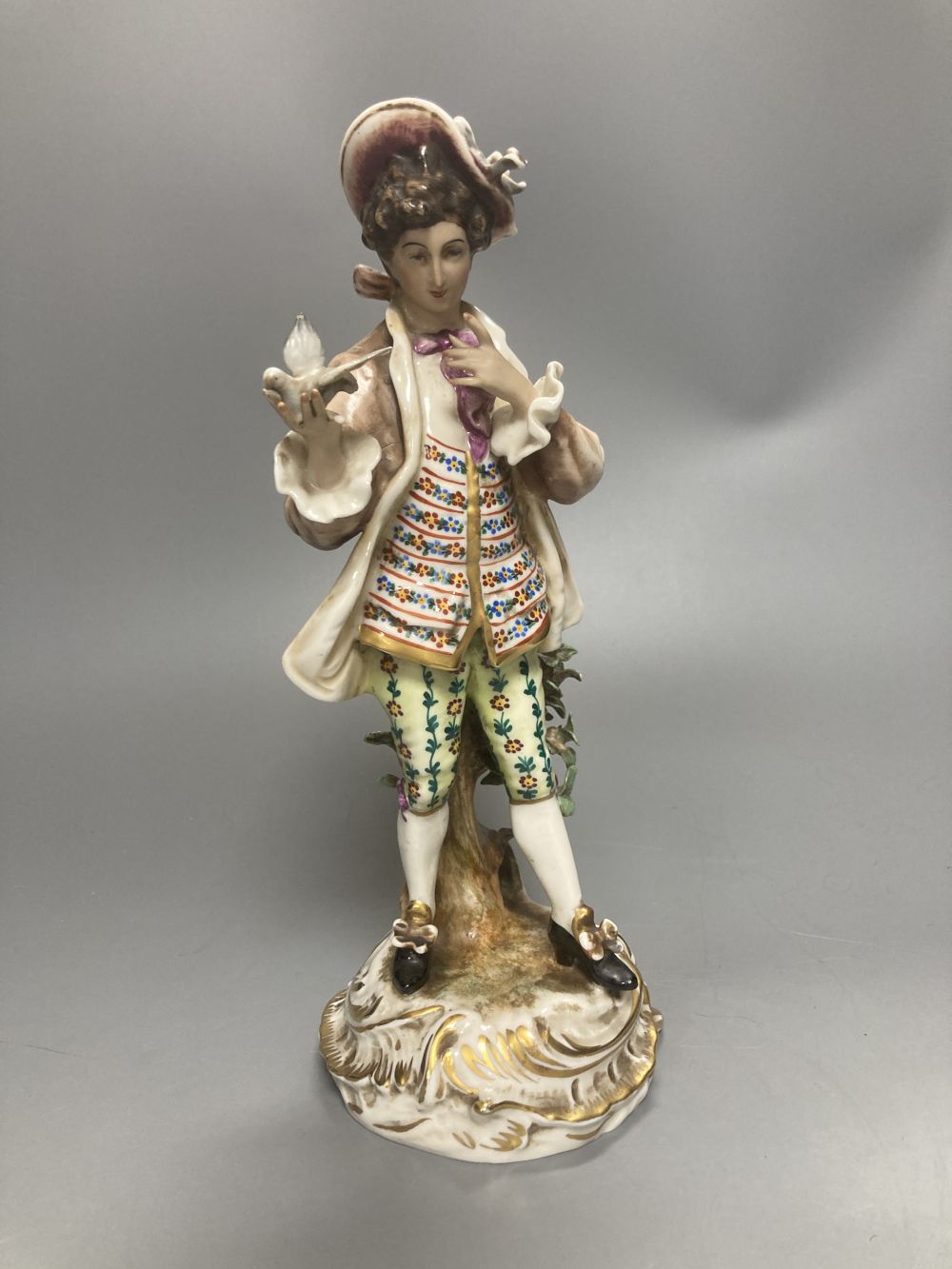A pair of Wessel Frankenthal figures, 26cm, and a French bisque gallant, 29cm